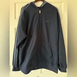 Nike hoodie size XL in navy with pattern on the sleeves